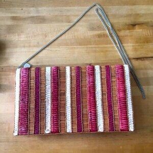 From St Xavier Andromeda fold over clutch-NWOT